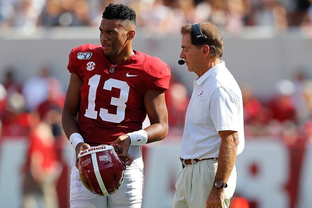 TUSCALOOSA, ALABAMA - SEPTEMBER 07:  Head coach Nick Saban of the Alabama Crimson Tide converses with Tua Tagovailoa #13 against the New Mexico State Aggies at Bryant-Denny Stadium on September 07, 2019 in Tuscaloosa, Alabama. (Photo by Kevin C. Cox/Getty Images)