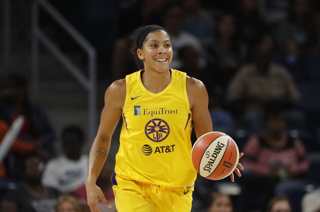 Los Angeles Sparks' Candace Parker advances the ball during the second half of a WNBA basketball game against the Chicago Sky Friday, Aug. 16, 2019, in Chicago. (AP Photo/Charles Rex Arbogast)