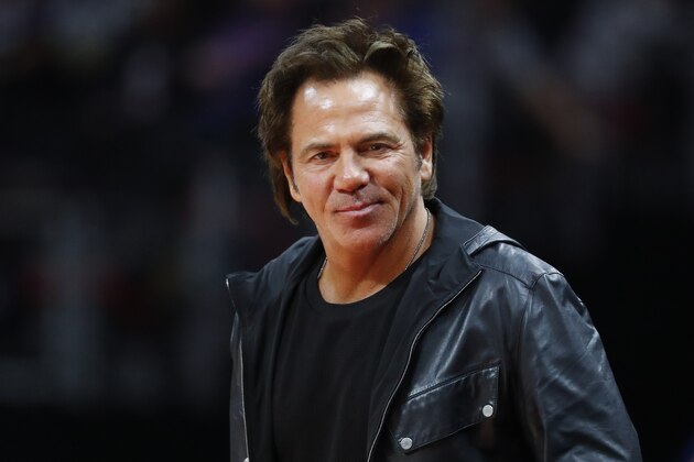 Detroit Pistons owner Tom Gores watches in the second half of an NBA basketball game against the Milwaukee Bucks in Detroit, Tuesday, Jan. 29, 2019. (AP Photo/Paul Sancya)
