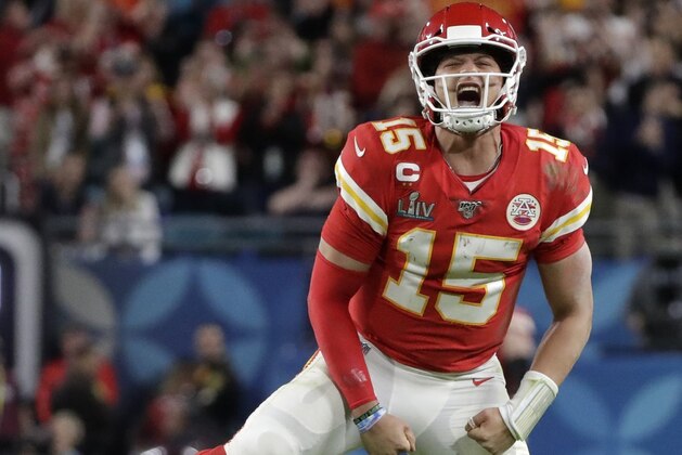 Kansas City Chiefs quarterback Patrick Mahomes (15) celebrates a long pass against the San Francisco 49ers during the second half of the NFL Super Bowl 54 football game Sunday, Feb. 2, 2020, in Miami Gardens, Fla. (AP Photo/Wilfredo Lee)