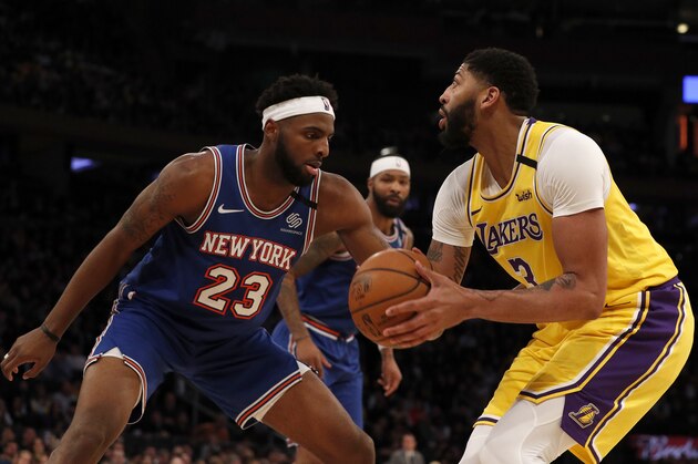 NEW YORK, NEW YORK - JANUARY 22:  (NEW YORK DAILIES OUT)   Anthony Davis #3 of the Los Angeles Lakers in action against Mitchell Robinson #23 of the New York Knicks at Madison Square Garden on January 22, 2020 in New York City. The Lakers defeated the Knicks 100-92.  NOTE TO USER: User expressly acknowledges and agrees that, by downloading and or using this photograph, User is consenting to the terms and conditions of the Getty Images License Agreement. (Photo by Jim McIsaac/Getty Images)