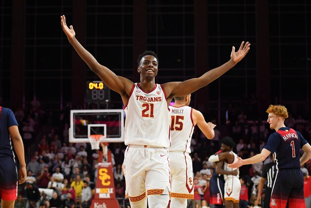 LOS ANGELES, CA - FEBRUARY 27:  Onyeka Okongwu #21 of the USC Trojans acknowledges the crowd after defeating the Arizona Wildcats 57-48 at Galen Center on February 27, 2020 in Los Angeles, California. (Photo by Jayne Kamin-Oncea/Getty Images)