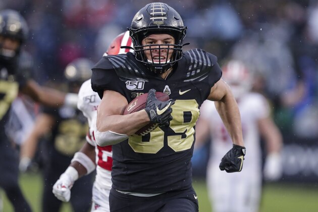 Purdue tight end Brycen Hopkins (89) runs in for a touchdown against Purdue during the first half of an NCAA college football game in West Lafayette, Ind., Saturday, Nov. 30, 2019. (AP Photo/Michael Conroy)