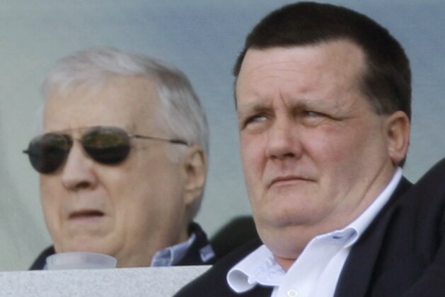 New York Yankees principal owner George Steinbrenner, left, watches a spring training baseball game against the University of South Florida with his son Hank Steinbrenner Friday, Feb. 29, 2008 in Tampa, Fla. (AP Photo/Julie Jacobson)