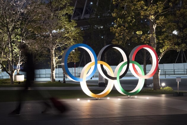 FILE - In this March 30, 2020, file photo, the Olympic rings are seen, in Tokyo. The Tokyo Olympics will open next year in the same time slot scheduled for this year's games. Tokyo organizers said Tuesday, April 14, 2020 they have no “B Plan” for again rescheduling the Olympics, which were postponed until next year by the virus pandemic. They say they are going forward under the assumption the Olympics will open on July 23, 2021. (AP Photo/Jae C. Hong, File)