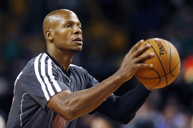 Miami Heat's Ray Allen warms up before an NBA basketball game against the Boston Celtics in Boston, Monday, March 18, 2013. (AP Photo/Michael Dwyer)
