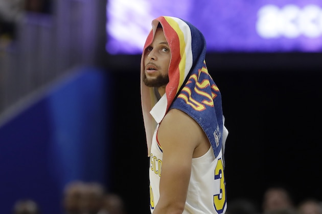 Golden State Warriors guard Stephen Curry (30) against the Toronto Raptors during an NBA basketball game in San Francisco, Thursday, March 5, 2020. (AP Photo/Jeff Chiu)