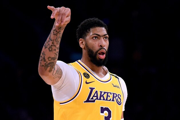 LOS ANGELES, CALIFORNIA - MARCH 10:  Anthony Davis #3 of the Los Angeles Lakers looks at the Brooklyn Nets bench after his three pointer during a 104-102 Nets win at Staples Center on March 10, 2020 in Los Angeles, California. (Photo by Harry How/Getty Images)  NOTE TO USER: User expressly acknowledges and agrees that, by downloading and or using this photograph, User is consenting to the terms and conditions of the Getty Images License Agreement.
