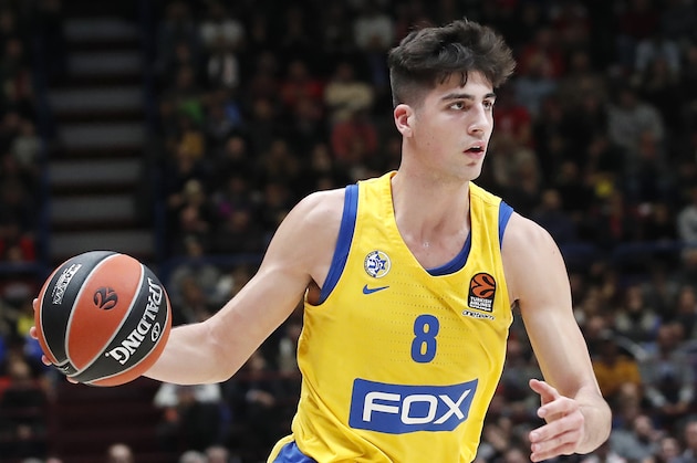 Maccabi Fox Tel Aviv's Deni Avdija controls the ball during the Euro League basketball match between Olimpia Milan and Maccabi Fox Tel Aviv, in Milan, Italy, Tuesday, Nov. 19, 2019. (AP Photo/Antonio Calanni)