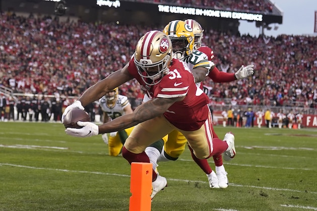 Raheem Mostert, corredor de los 49ers de San Francisco, anota frente a Darnell Savage, de los Packers de Green Bay, durante el encuentro por el tรยญtulo de la Conferencia Nacional, el domingo 19 de enero de 2020 en Santa Clara, California (AP Foto/Tony Avelar) Raheem Mostert, corredor de los 49ers de San Francisco, anota frente a Darnell Savage, de los Packers de Green Bay, durante el encuentro por el tรยญtulo de la Conferencia Nacional, el domingo 19 de enero de 2020 en Santa Clara, California (AP Foto/Tony Avelar)