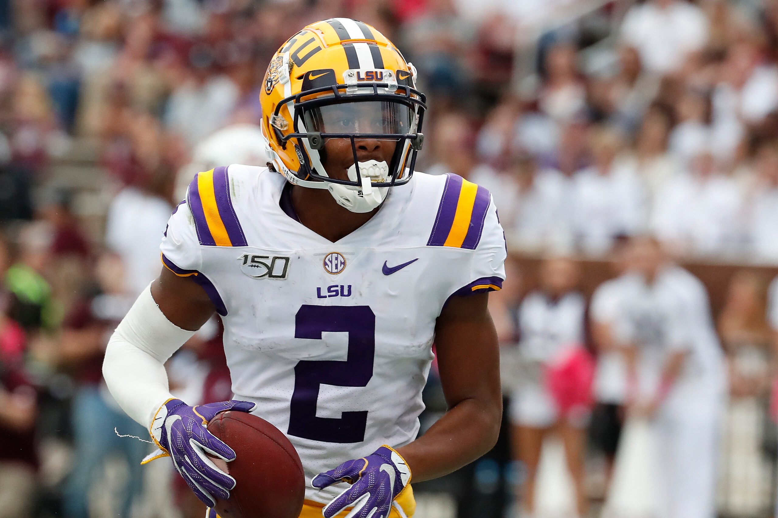 LSU wide receiver Justin Jefferson (2) runs towards the sidelines after a short pass reception against Mississippi State during the first half of their NCAA college football game in Starkville, Miss., Saturday, Oct. 19, 2019. LSU won 36-13. (AP Photo/Rogelio V. Solis)