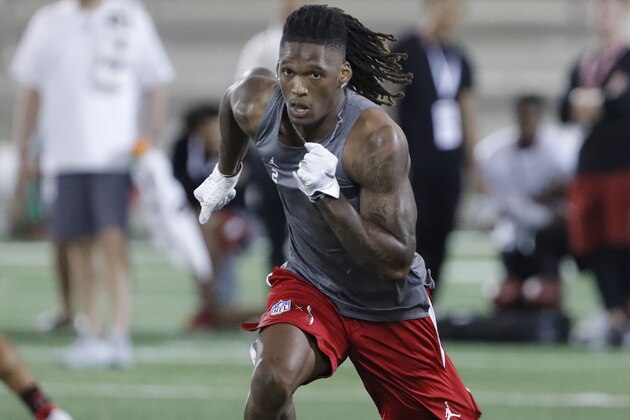Oklahoma wide receiver CeeDee Lamb runs through drills during Pro Day for NFL football scouts and coaches in Norman, Okla., Wednesday, March 11, 2020. (AP Photo/Alonzo Adams) Oklahoma wide receiver CeeDee Lamb runs through drills during Pro Day for NFL football scouts and coaches in Norman, Okla., Wednesday, March 11, 2020. (AP Photo/Alonzo Adams)