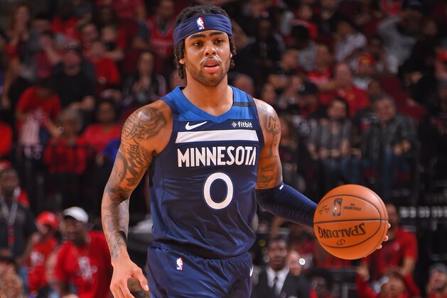 HOUSTON, TX - MARCH 10: D'Angelo Russell #0 of the Minnesota Timberwolves handles the ball during the game against the Houston Rockets on March 10, 2020 at the Toyota Center in Houston, Texas. NOTE TO USER: User expressly acknowledges and agrees that, by downloading and or using this photograph, User is consenting to the terms and conditions of the Getty Images License Agreement. Mandatory Copyright Notice: Copyright 2020 NBAE (Photo by Bill Baptist/NBAE via Getty Images) HOUSTON, TX - MARCH 10: D'Angelo Russell #0 of the Minnesota Timberwolves handles the ball during the game against the Houston Rockets on March 10, 2020 at the Toyota Center in Houston, Texas. NOTE TO USER: User expressly acknowledges and agrees that, by downloading and or using this photograph, User is consenting to the terms and conditions of the Getty Images License Agreement. Mandatory Copyright Notice: Copyright 2020 NBAE (Photo by Bill Baptist/NBAE via Getty Images)