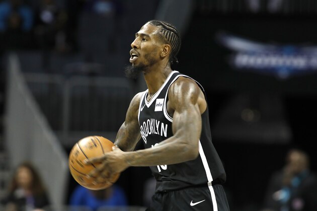 Brooklyn Nets' Iman Shumpert (10) looks to pass the ball against the Charlotte Hornets during the first half of an NBA basketball game in Charlotte, N.C., Friday, Dec. 6, 2019. The Nets won 111-104. (AP Photo/Bob Leverone)
