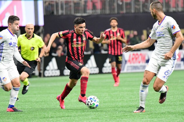 ATLANTA, GA - MARCH 07: Atlanta United midfielder Ezequiel Barco #7 dribbles the ball during the match against FC Cincinnati, which Atlanta won, 2-1, in front of a crowd of 69,301 at Mercedes-Benz Stadium during a game between FC Cincinnati and Atlanta United FC at Mercedes-Benz Stadium on March 07, 2020 in Atlanta, Georgia. (Photo by Perry McIntyre/ISI Photos/Getty Images) ATLANTA, GA - MARCH 07: Atlanta United midfielder Ezequiel Barco #7 dribbles the ball during the match against FC Cincinnati, which Atlanta won, 2-1, in front of a crowd of 69,301 at Mercedes-Benz Stadium during a game between FC Cincinnati and Atlanta United FC at Mercedes-Benz Stadium on March 07, 2020 in Atlanta, Georgia. (Photo by Perry McIntyre/ISI Photos/Getty Images)