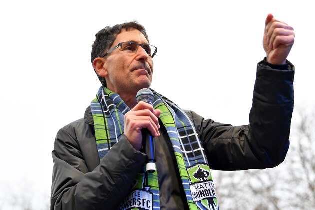 SEATTLE, WASHINGTON - NOVEMBER 12: Seattle Sounders majority owner, Adrian Hanauer, talks to the fans during the MLS Cup Champions Parade & Rally on November 12, 2019 in Seattle, Washington. (Photo by Alika Jenner/Getty Images)