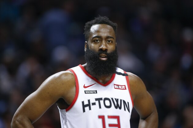 Houston Rockets guard James Harden stands on the court during a break in the action against the Charlotte Hornets during the second half of an NBA basketball game in Charlotte, N.C., Saturday, March 7, 2020. Charlotte won 108-99. (AP Photo/Nell Redmond)