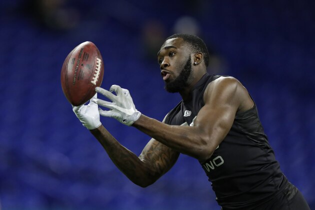 Baylor wide receiver Denzel Mims runs a drill at the NFL football scouting combine in Indianapolis, Thursday, Feb. 27, 2020. (AP Photo/Michael Conroy)