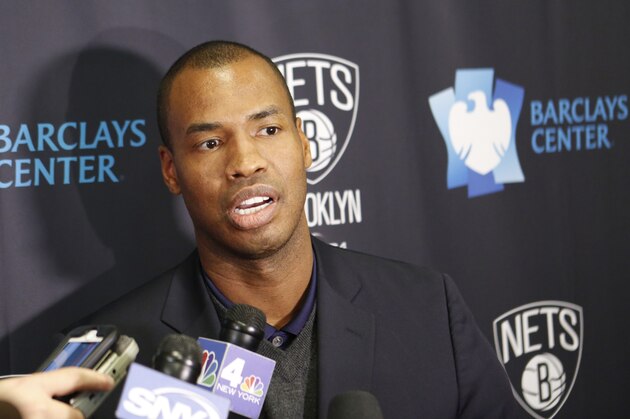 Jason Collins, a 13-year NBA veteran and the NBA's only openly gay player, announces his retirement at a news conference before a basketball game between the Milwaukee Bucks and the Brooklyn Nets on Wednesday, Nov. 19, 2014, in New York. Collins joined the Nets in February and played 22 games for the team, but was not on the roster this season. (AP Photo/Kathy Willens)