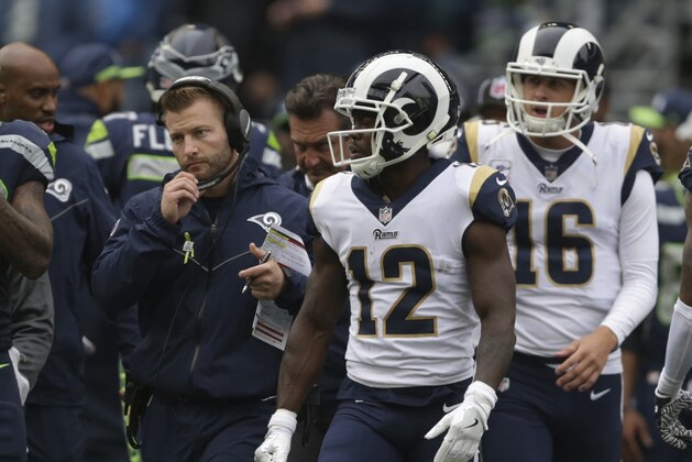 Los Angeles Rams' Brandin Cooks (12) gets up after an injury and walks with head coach Sean McVay, left, during the first half of an NFL football game against the Seattle Seahawks, Sunday, Oct. 7, 2018, in Seattle. (AP Photo/Scott Eklund) Los Angeles Rams' Brandin Cooks (12) gets up after an injury and walks with head coach Sean McVay, left, during the first half of an NFL football game against the Seattle Seahawks, Sunday, Oct. 7, 2018, in Seattle. (AP Photo/Scott Eklund)