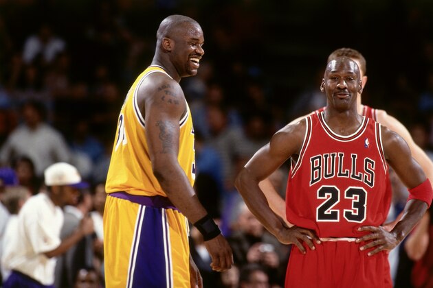 INGLEWOOD, CA - FEBRUARY 1: Shaquille O'Neal #34 of the Los Angeles Lakers jokes with Michael Jordan #23 of the Chicago Bulls on February 1, 1998 at The Forum in Inglewood, California. NOTE TO USER: User expressly acknowledges and agrees that, by downloading and/or using this Photograph, user is consenting to the terms and conditions of the Getty Images License Agreement. Mandatory Copyright Notice: Copyright 1998 NBAE (Photo by Andrew D. Bernstein/NBAE via Getty Images)