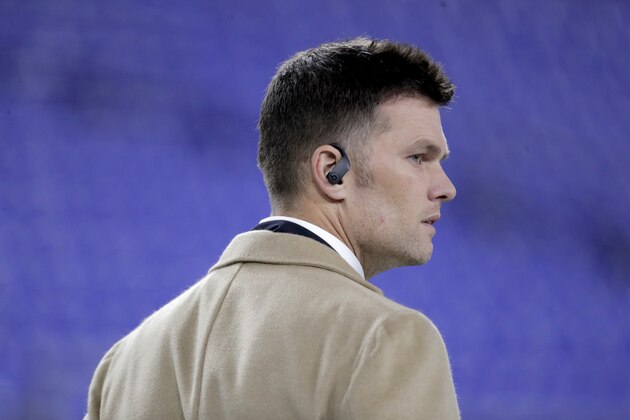 New England Patriots quarterback Tom Brady wears Beats earbuds as he walks on the field prior to an NFL football game against the Baltimore Ravens, Sunday, Nov. 3, 2019, in Baltimore. (AP Photo/Julio Cortez)