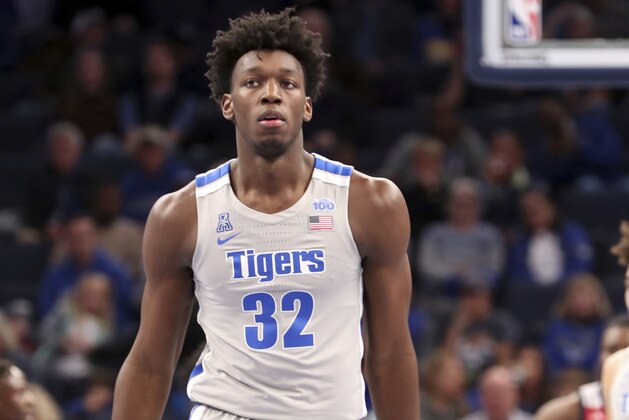 Memphis' James Wiseman (32) pauses between plays in an NCAA college basketball game against University of Illinois-Chicago Saturday, Nov. 9, 2019, in Memphis, Tenn. (AP Photo/Karen Pulfer Focht)