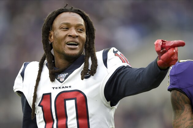 Houston Texans wide receiver DeAndre Hopkins signals during the second half of an NFL football game against the Baltimore Ravens, Sunday, Nov. 17, 2019, in Baltimore. (AP Photo/Gail Burton)