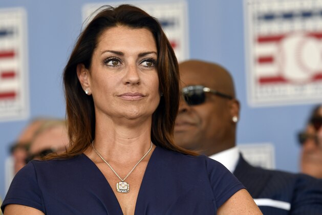 Brandy Halladay window of Roy Halladay speaks as he is inducted posthumously into the National Baseball Hall of Fame during an induction ceremony at the Clark Sports Center on Sunday, July 21, 2019, in Cooperstown, N.Y. (AP Photo/Hans Pennink)
