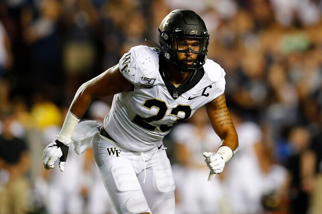 Wake Forest linebacker Justin Strnad (23) runs toward the play during an NCAA football game on Friday, Sept. 6, 2019 in Houston. (AP Photo/Matt Patterson)