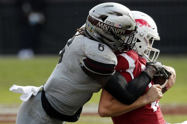 Mississippi State linebacker Willie Gay Jr. (6) sacks Arkansas quarterback Connor Noland (13) during the second half of an NCAA college football game in Starkville, Miss., Saturday, Nov. 17, 2018. Mississippi State won 52-6. (AP Photo/Rogelio V. Solis)