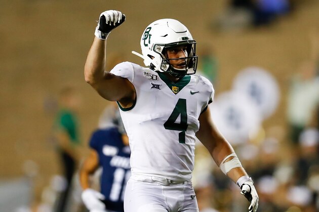 Baylor University linebacker Clay Johnston (4) signals a defensive stop during an NCAA football game on Saturday, Sept. 21, 2019 in Houston. (AP Photo/Matt Patterson)