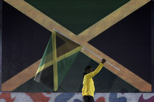 BUENOS AIRES, ARGENTINA - OCTOBER 06: Flag bearer of Jamaica Shanthamoi Brown walks the stage during the opening ceremony of the Buenos Aires 2018 Youth Olympic Games at Obelisco monument on October 06, 2018 in Buenos Aires, Argentina. (Photo by Buda Mendes/Getty Images)