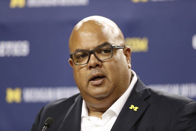 Michigan Director of Athletics Warde Manuel addresses the media after Juwan Howard was introduced as the new men's basketball coach, Thursday, May 30, 2019 in Ann Arbor, Mich. (AP Photo/Carlos Osorio)