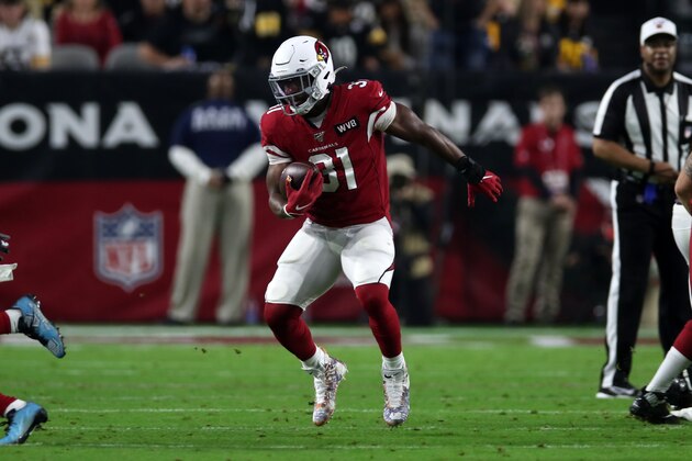 PHOENIX, AZ - DECEMBER 08: David Johnson #31 of the Arizona Cardinals runs with the ball during the game against the Pittsburgh Steelers at State Farm Stadium on December 8, 2019 in Glendale, Arizona. The Steelers defeated the Cardinals 23-17. (Photo by Rob Leiter via Getty Images)