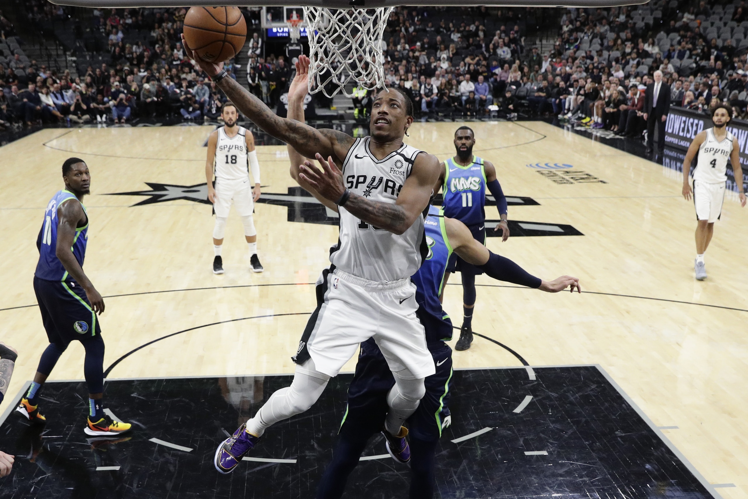 San Antonio Spurs forward DeMar DeRozan (10) scores against the Dallas Mavericks during the second half of an NBA basketball game in San Antonio, Wednesday, Feb. 26, 2020. (AP Photo/Eric Gay) San Antonio Spurs forward DeMar DeRozan (10) scores against the Dallas Mavericks during the second half of an NBA basketball game in San Antonio, Wednesday, Feb. 26, 2020. (AP Photo/Eric Gay)