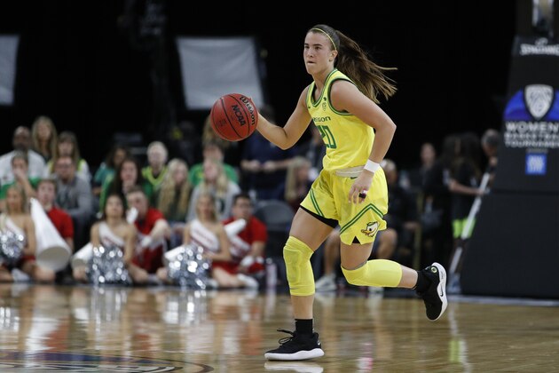 FILE - In this March 6, 2020, file photo, Oregon's Sabrina Ionescu (20) plays against Utah in an NCAA college basketball game in the quarterfinal round of the Pac-12 women's tournament in Las Vegas. The Associated Press had a panel of WNBA coaches and general managers hold a mock draft. (AP Photo/John Locher, File)