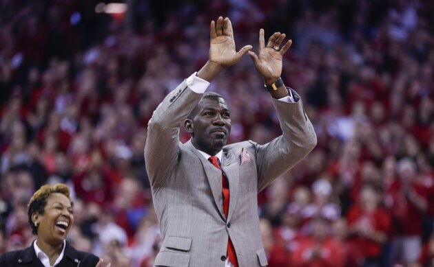 Former Wisconsin basketball player Michael Finley is honored during a timeout in an NCAA college basketball game between Wisconsin and Michigan Sunday, Feb. 28, 2016, in Madison, Wis. (AP Photo/Andy Manis)