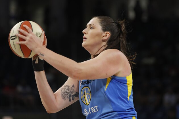 FILE - In this Aug. 16, 2019, file photo, Chicago Sky's Stefanie Dolson shoots during the first half of the team's WNBA basketball game against the Los Angeles Sparks in Chicago. It's been a busy week for Dolson. She was part of the NBA All-Star festivities this past weekend in Chicago as well as being selected to the USA Basketball 3-on-3 qualifying team. The All-Star center also re-signed with the Sky. The free agent said that she never considered going anywhere else and always wanted to stay in Chicago. (AP Photo/Charles Rex Arbogast, File)
