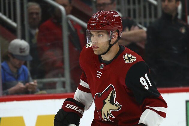 Arizona Coyotes left wing Taylor Hall skates to the puck during the first period of an NHL hockey game against the Los Angeles Kings Thursday, Jan. 30, 2020, in Glendale, Ariz. The Kings defeated the Coyotes 3-2 in overtime. (AP Photo/Ross D. Franklin)