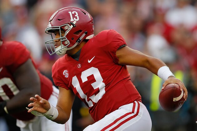 TUSCALOOSA, AL - NOVEMBER 24:  Tua Tagovailoa #13 of the Alabama Crimson Tide rushes against the Auburn Tigers at Bryant-Denny Stadium on November 24, 2018 in Tuscaloosa, Alabama.  (Photo by Kevin C. Cox/Getty Images)
