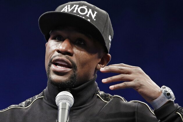 Floyd Mayweather Jr. speaks at a news conference after a super welterweight boxing match against Conor McGregor, Sunday, Aug. 27, 2017, in Las Vegas. (AP Photo/Isaac Brekken)