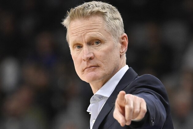 Golden State Warriors head coach Steve Kerr gestures to his players during the second half of an NBA basketball game against the San Antonio Spurs, Tuesday, Dec. 31, 2019, in San Antonio. San Antonio won 117-113 in overtime. (AP Photo/Darren Abate)