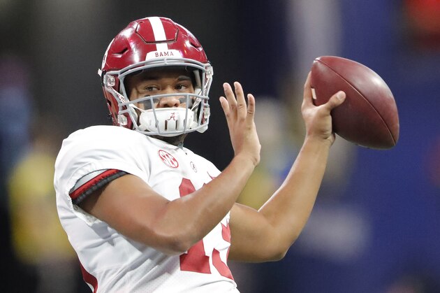 Alabama quarterback Tua Tagovailoa (13) warms up ahead of the Southeastern Conference championship NCAA college football game between Georgia and Alabama, Saturday, Dec. 1, 2018, in Atlanta. (AP Photo/John Bazemore)