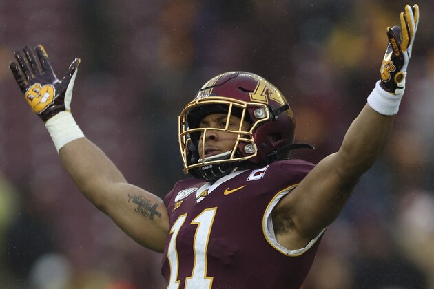 FILE - In this Nov. 30, 2019, file photo. Minnesota defensive back Antoine Winfield Jr. (11) gestures during an NCAA college football game against Wisconsin, in Minneapolis. Winfield was selected to The Associated Press All-America team, Monday, Dec. 16, 2019. (AP Photo/Stacy Bengs, File) FILE - In this Nov. 30, 2019, file photo. Minnesota defensive back Antoine Winfield Jr. (11) gestures during an NCAA college football game against Wisconsin, in Minneapolis. Winfield was selected to The Associated Press All-America team, Monday, Dec. 16, 2019. (AP Photo/Stacy Bengs, File)