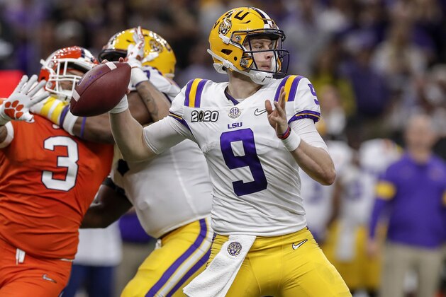 NEW ORLEANS, LA - JANUARY 13: Quarterback Joe Burrow #9 of the LSU Tigers on a pass play during the College Football Playoff National Championship game against the Clemson Tigers at the Mercedes-Benz Superdome on January 13, 2020 in New Orleans, Louisiana. LSU defeated Clemson 42 to 25. (Photo by Don Juan Moore/Getty Images)