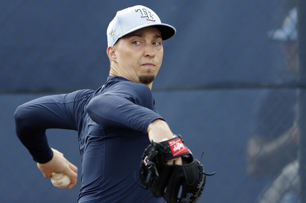 Tampa Bay Rays starting pitcher Blake Snell (4) throws Tampa Bay Rays starting pitcher Blake Snell (4) throws during spring training baseball camp Friday, Feb. 14, 2020, in Port Charlotte, Fla. (AP Photo/John Bazemore)