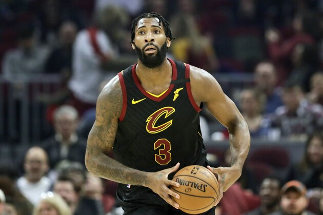 FILE - In this Feb. 12, 2020, file photo, Cleveland Cavaliers' Andre Drummond plays against the Atlanta Hawks in the first half of an NBA basketball gamein Cleveland. General manager Koby Altman wasn't necessarily in the market for another front court player, not with Tristan Thompson, Kevin Love and Larry Nance Jr. already on the roster. But he said the chance to add a player of Drummond's caliber, a versatile, rebounding machine and proven veteran who will make the Cavs' younger players better immediately and perhaps in the future, was too enticing.(AP Photo/Tony Dejak, File)
