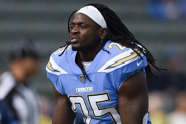 Los Angeles Chargers running back Melvin Gordon III stretches prior to an NFL football game against the Oakland Raiders in Carson, Calif., Sunday, Dec. 22, 2019. (AP Photo/Kelvin Kuo)