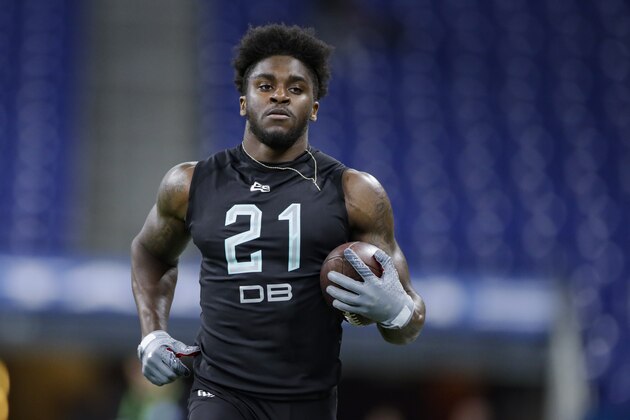 Utah defensive back Jaylon Johnson runs a drill at the NFL football scouting combine in Indianapolis, Sunday, March 1, 2020. (AP Photo/Michael Conroy)